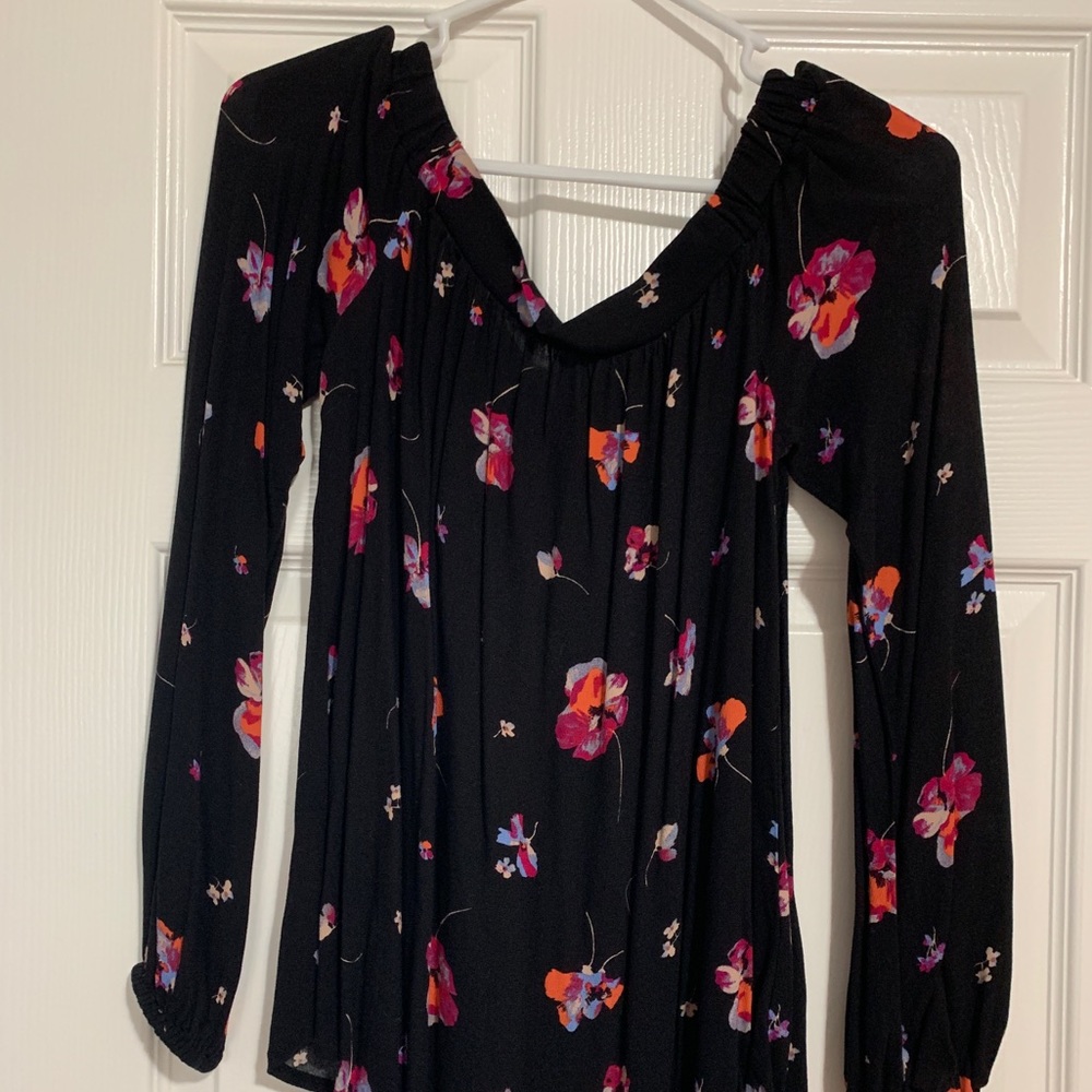 Off shoulder shirt.